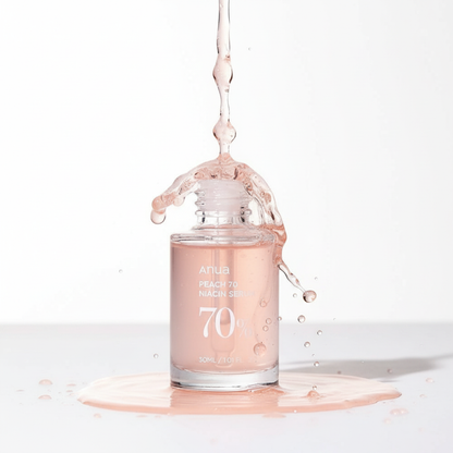 Anua Peach 70 Niacin Serum texture avec gouttes